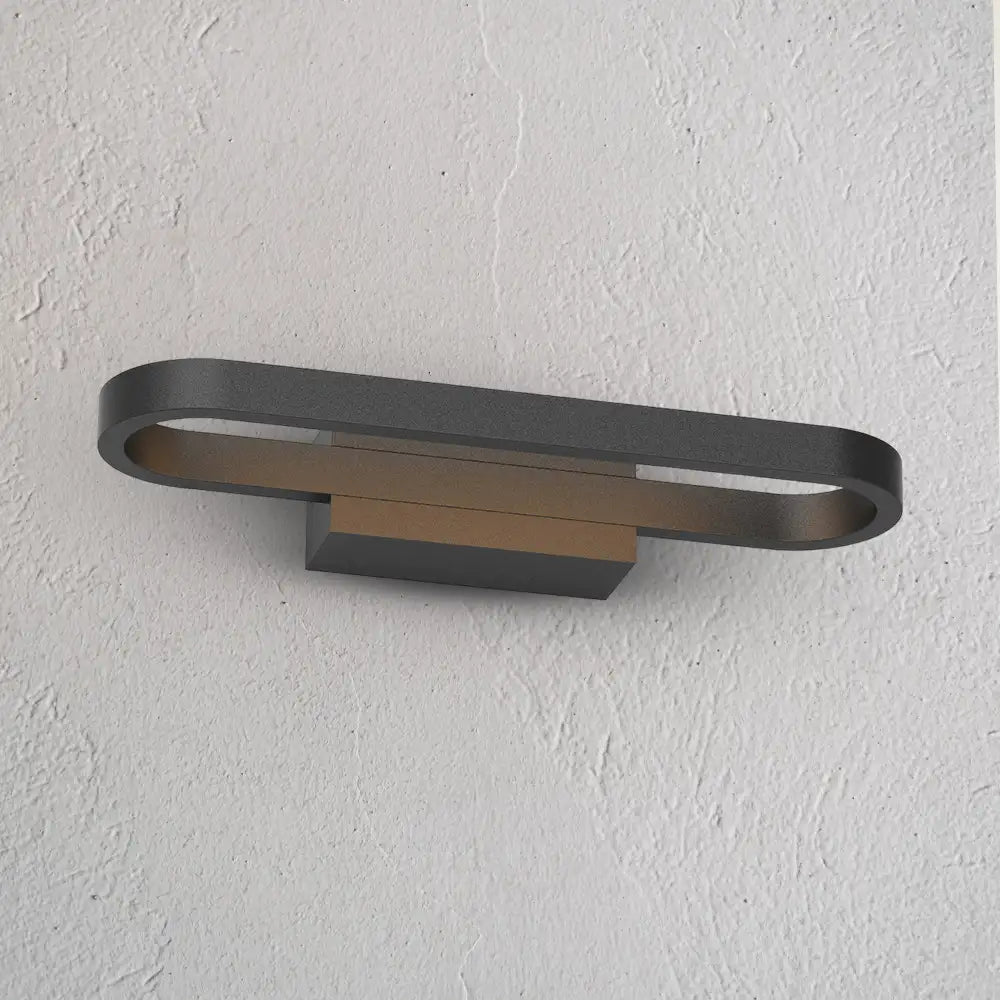 Aplique de pared LED en negro y dorado | Lámpara escultórica