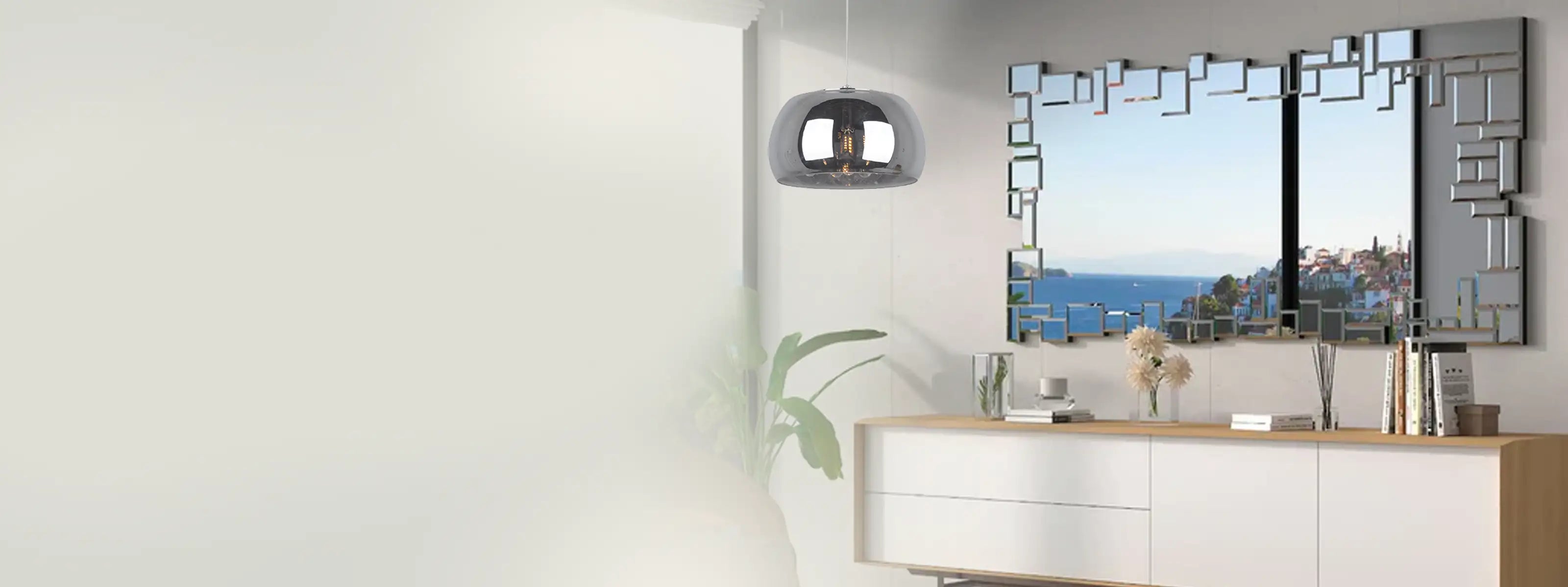 Espejos sobre pared y lampara colgante