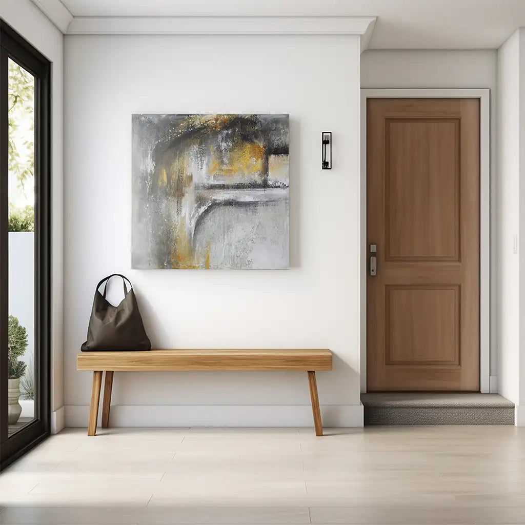 Cuadro abstracto pintado a mano con textura en tonos dorados y gris